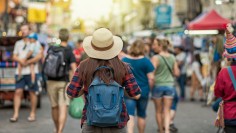 Back side of Young Asian traveling women walking and looking in Khaosan Road