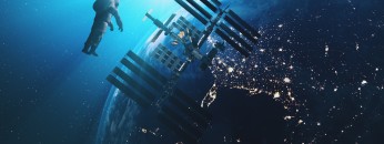 ISS astronaut in outer cosmos Earth background