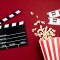 Movie clapperboard and cinema tickets. Home movie night, party invitation
